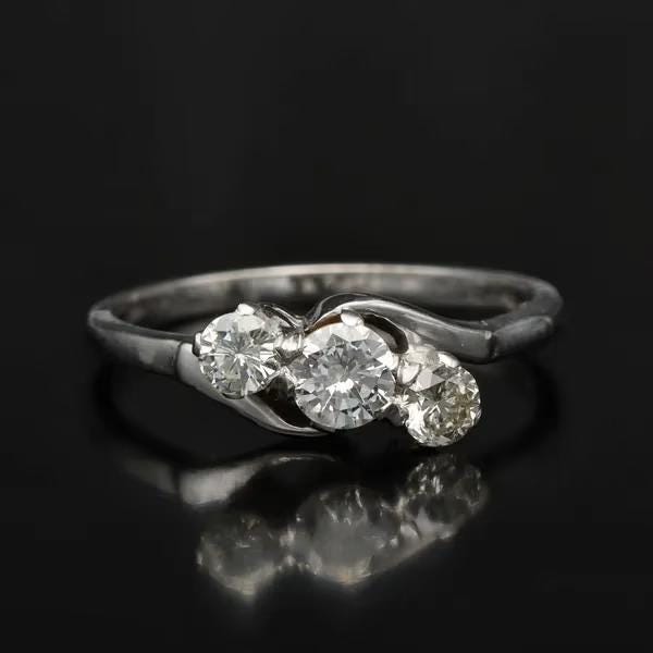 White Gold Three-Stone Diamond Ring - Twist Setting - Size K1/2